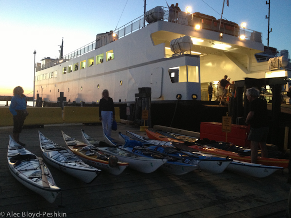 A fleet of kayaks, ready to load on the ferry.
